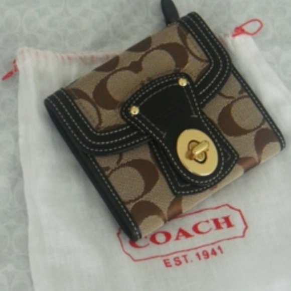 Coach Handbags - New Authentic COACH signature canvas wallet.